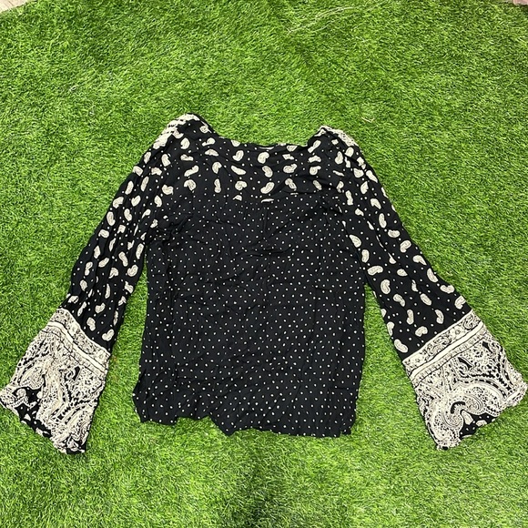 Ladies black and cream paisley and polka dot top with bell sleeves. - Picture 2 of 6